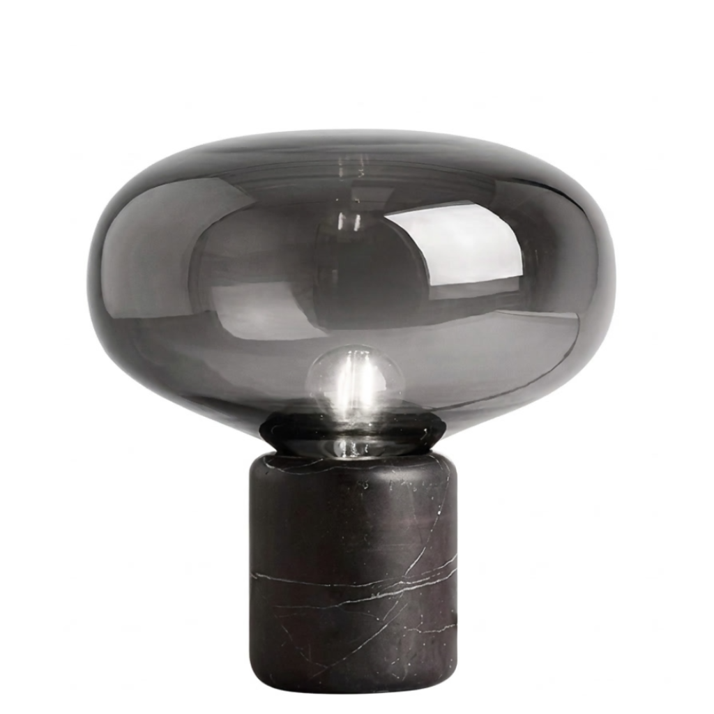 Lampe de chevet en marbre noir avec globe en verre fumé gris, sur fond blanc